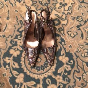 Pointed mid length heels